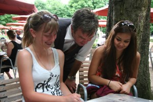 The French waiter flirts with Brittney and Hailey.