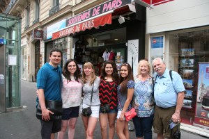 The whole group in front of the bus station.