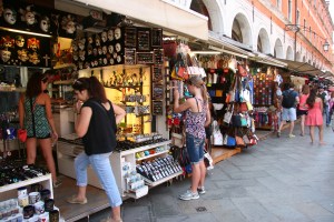 The girls shop in one of the booths at the Rialto Market.