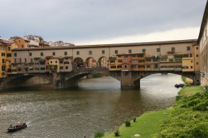 This bridge across the Arno River has shops and apartments built on it.