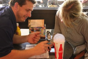 Brian and Brittney adding to the grocery list.