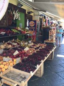 An alleyway fruit vendor.