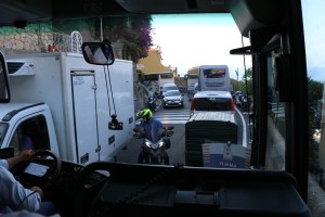 3 vehicles passing on a road not big enough for 2!